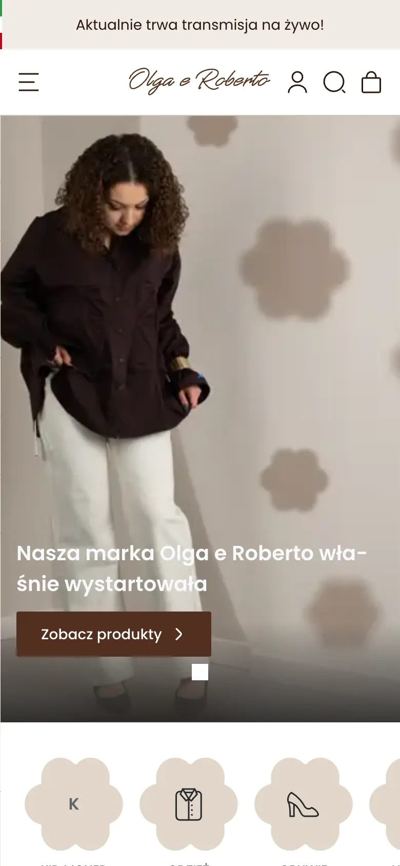 Strona główna sklepu Olga e Roberto na telefonie z paskiem „Aktualnie trwa transmisja na żywo!”